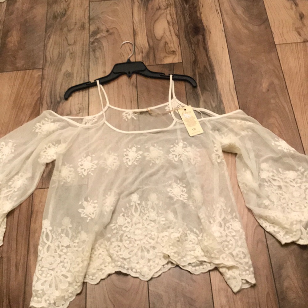 NWT sheer lace cold shoulder flowing top.